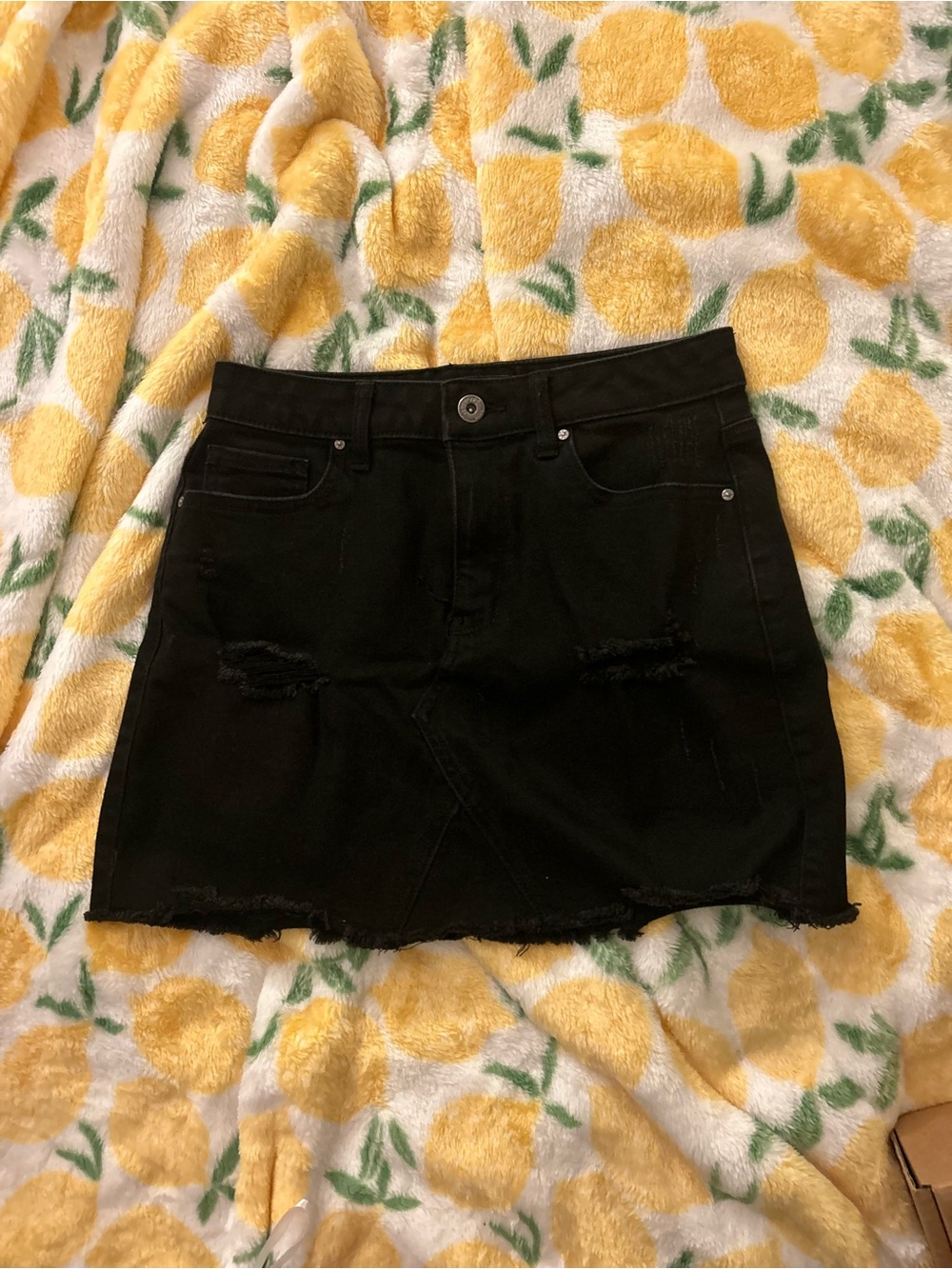 Black denim skirt